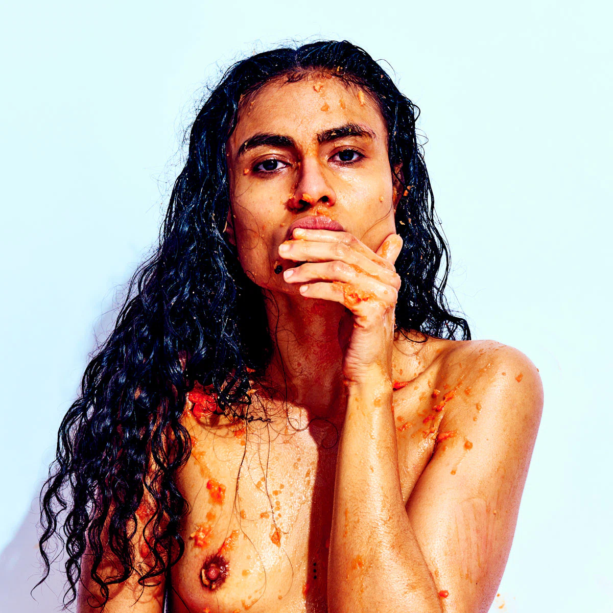 Artistic nude photography exploring playful interaction, color, and sensual energy