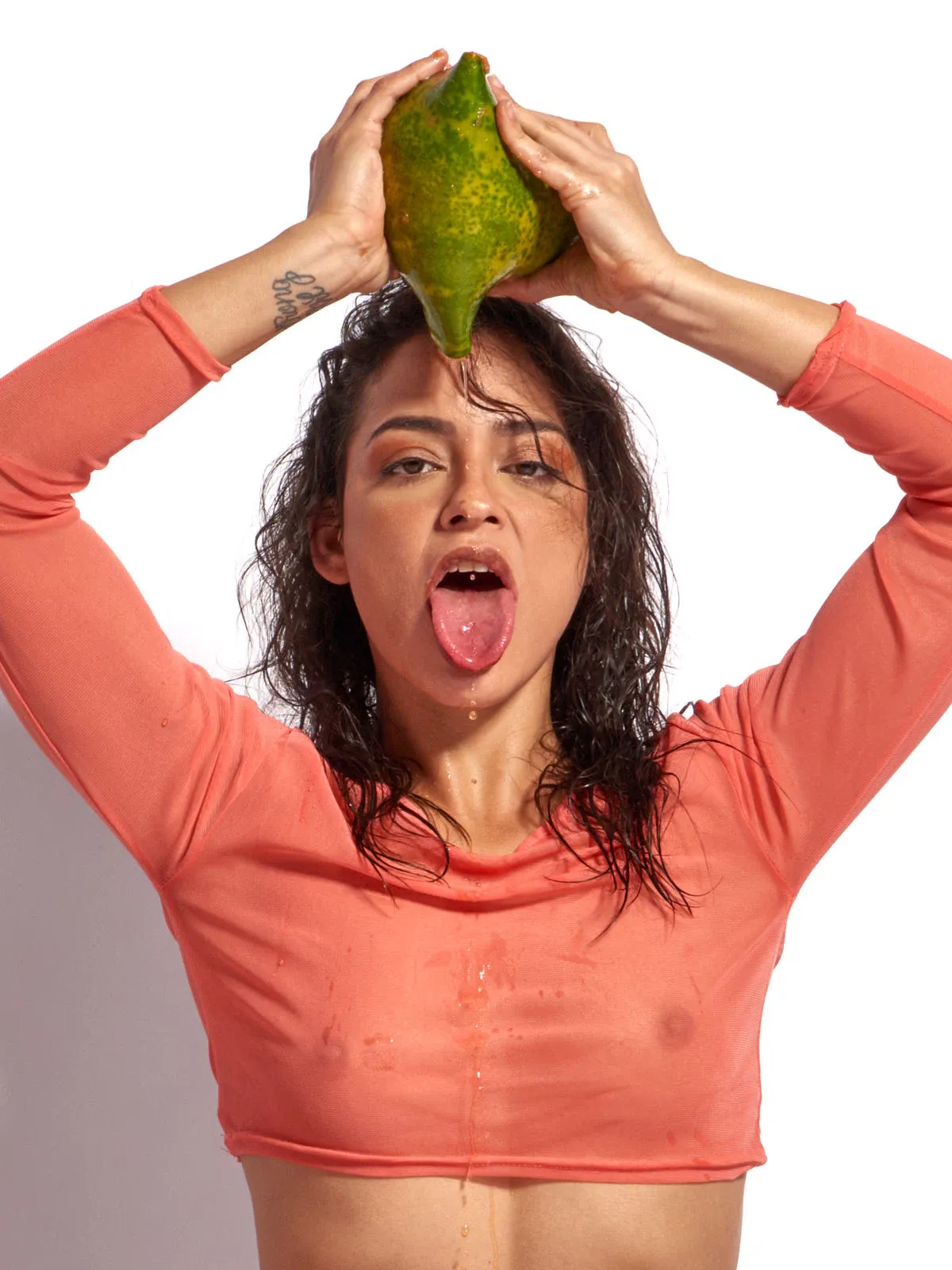 Editorial nude portrait showcasing confidence, expressive gestures, and refined eroticism