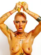 Erotic art portrait of Lu Epic nude with papaya fruit on her body and face