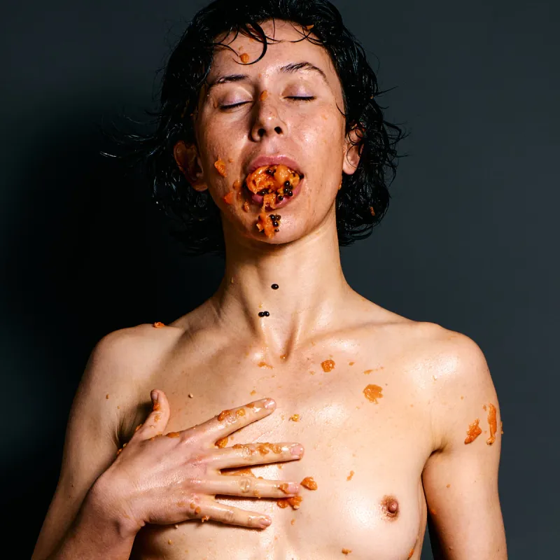 Ulah Bauer contemporary nude art Wet Papaya messy orange fruit expressive pose Barcelona photographer Cinaed Dane