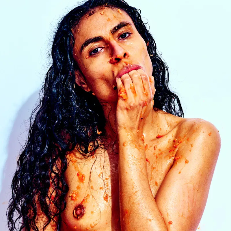 Artistic nude photography exploring playful interaction, color, and sensual energy