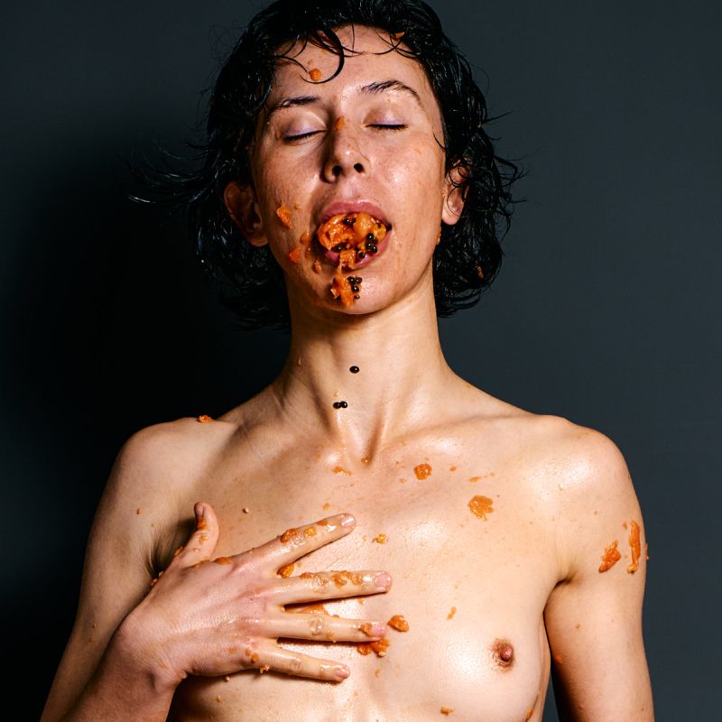 Ulah Bauer contemporary nude art Wet Papaya messy orange fruit expressive pose Barcelona photographer Cinaed Dane