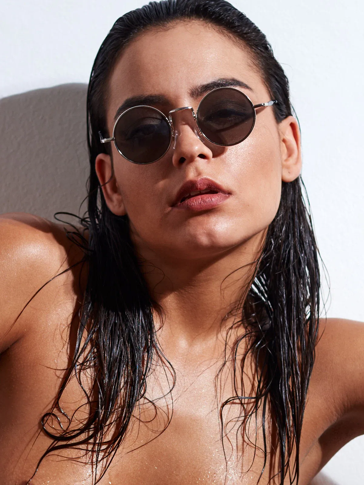 Joy Lamore nude except for net stockings, captured in bold, provocative fine art poses