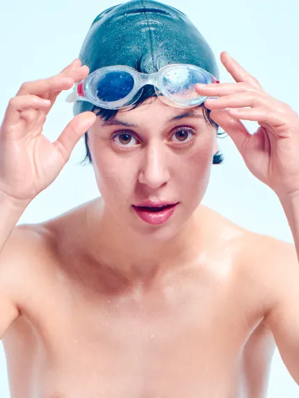 German model Ulah Bauer Swimmer aquatic nude photography swim cap blue backdrop Barcelona studio Cinaed Dane Spain